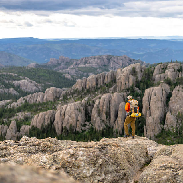 Hiker overlooking Custer State Park in South Dakota